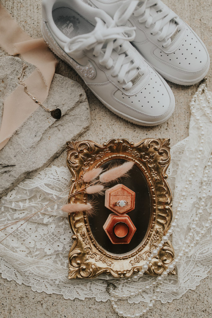 A wedding flat lay of details from a couple's wedding day.