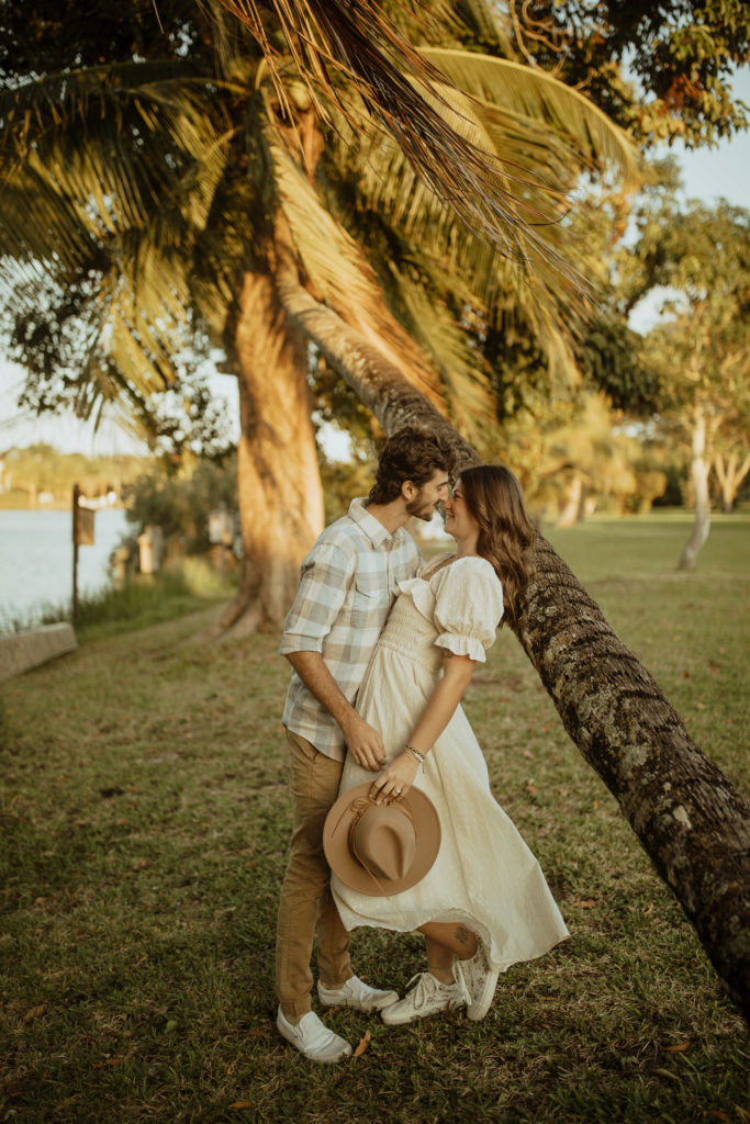 Engagement photos in west palm beach florida by palm trees