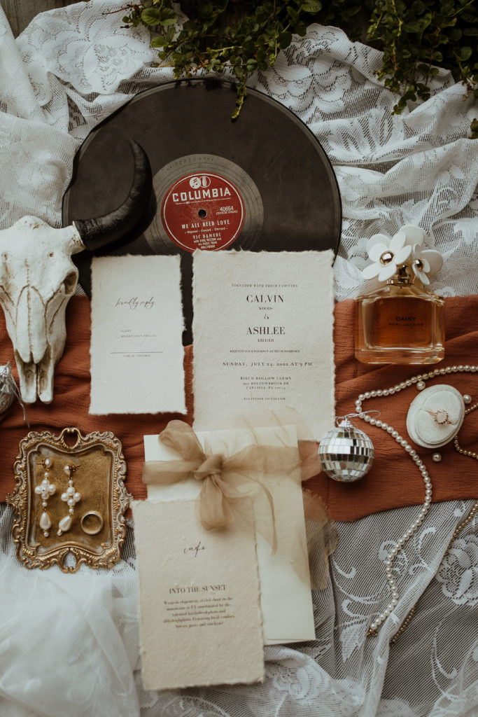 A flat lay of details from a central Pennsylvania couple's elopement 