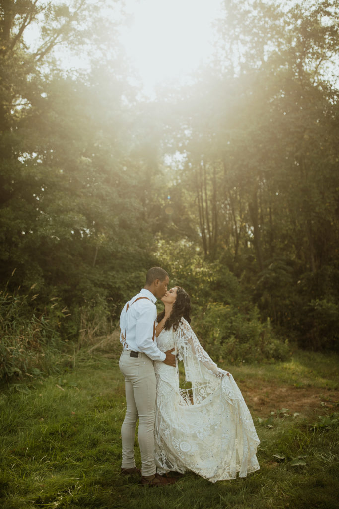 A couple eloping in front of the central Pennsylvania mountains at sunset