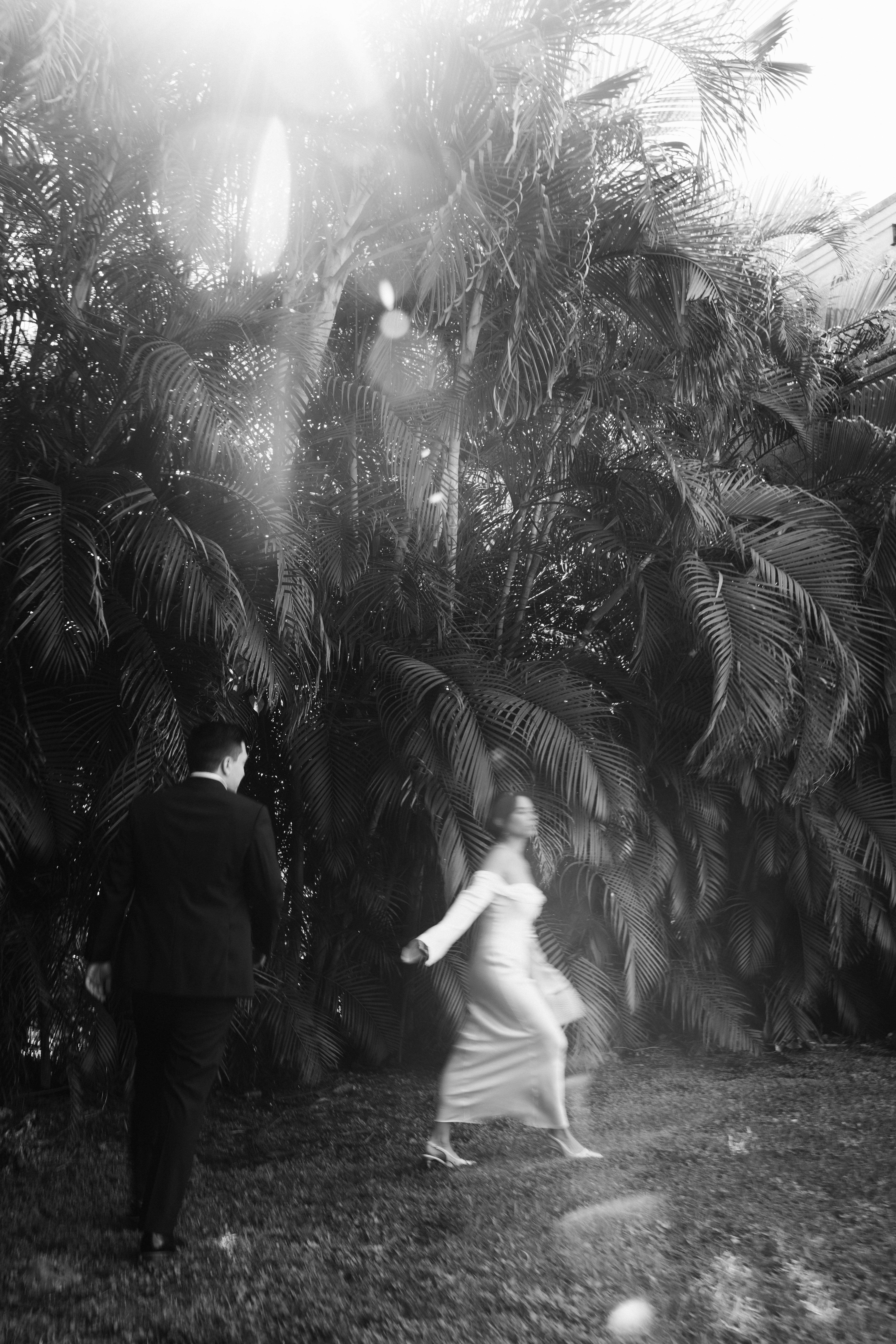 Elegant wedding couple photographed in front of European-style stone walls at The Spanish Monastery.