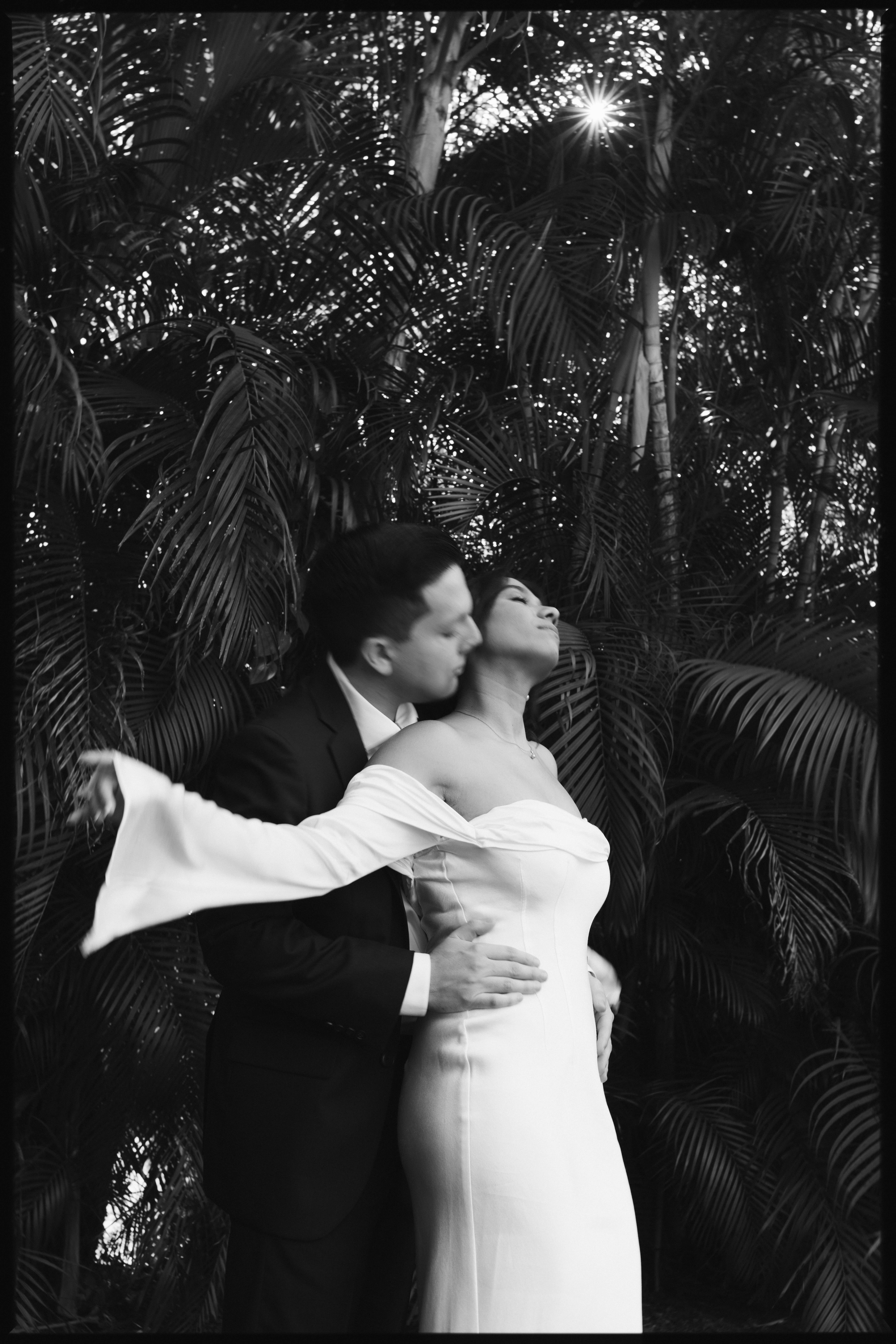 Elegant wedding couple photographed in front of European-style stone walls at The Spanish Monastery.