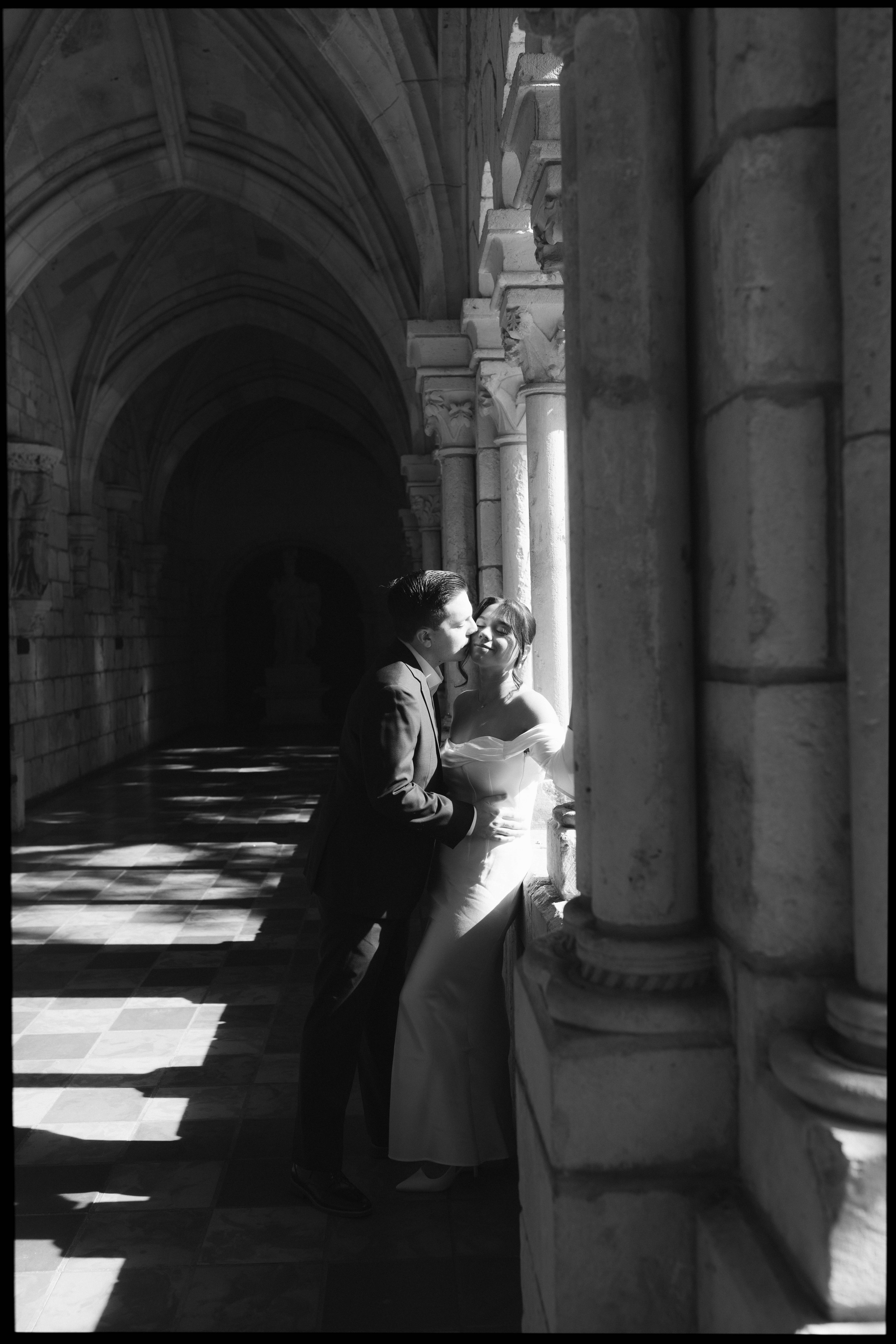 Romantic newlywed portraits in the gardens of The Spanish Monastery, a popular South Florida wedding venue