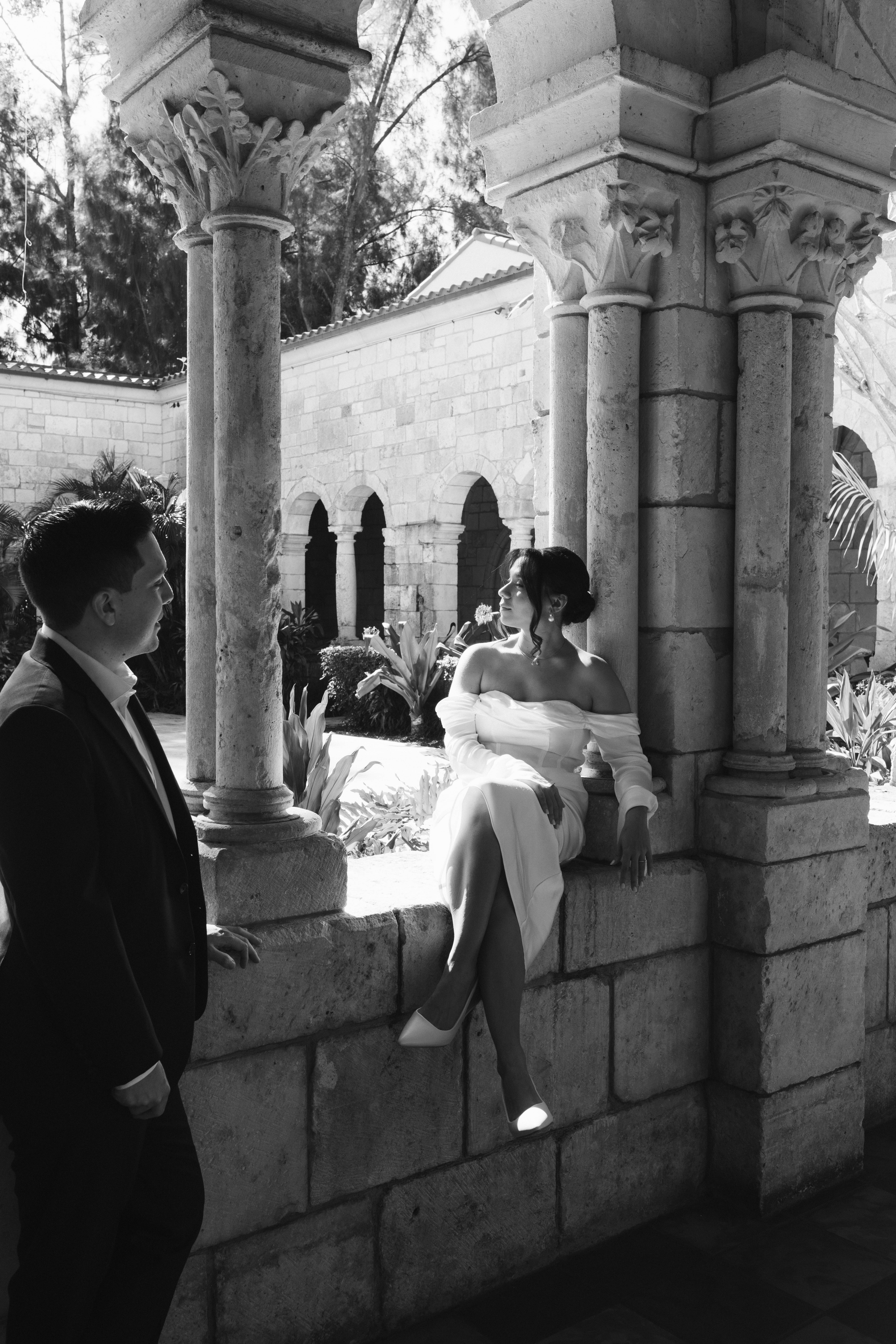 Romantic newlywed portraits in the gardens of The Spanish Monastery, a popular South Florida wedding venue