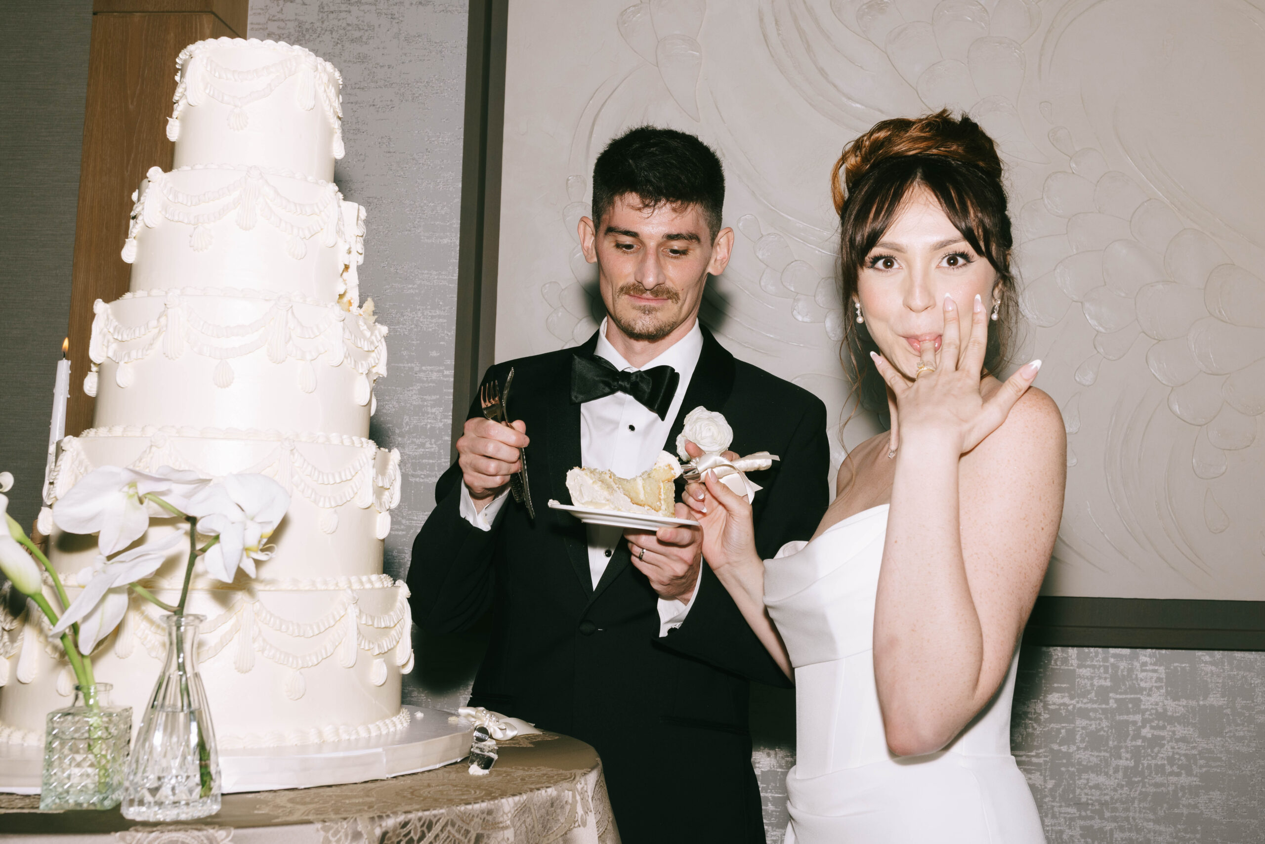 Lively Ritz-Carlton Fort Lauderdale wedding reception with dancing under elegant lighting