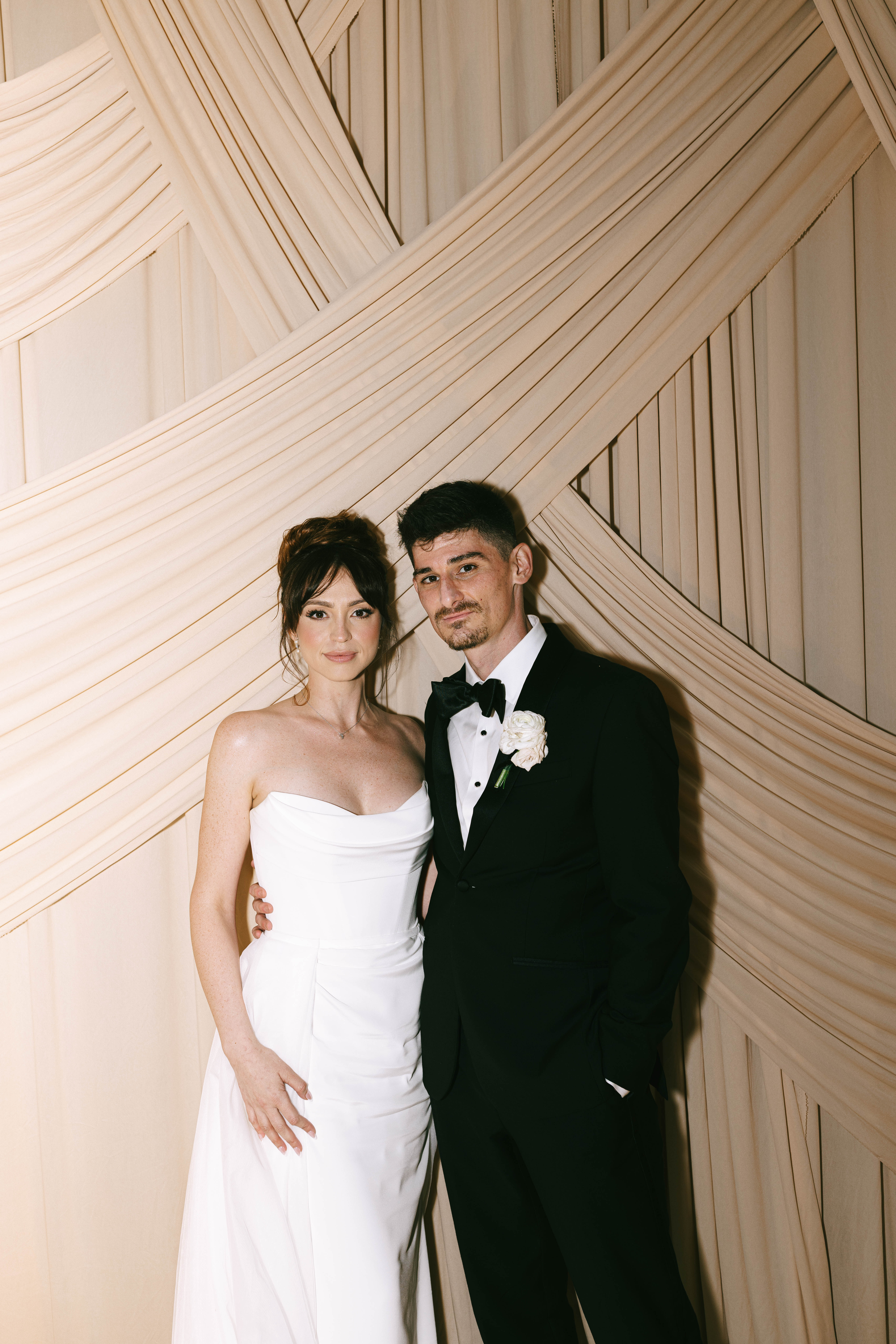 Lively Ritz-Carlton Fort Lauderdale wedding reception with dancing under elegant lighting