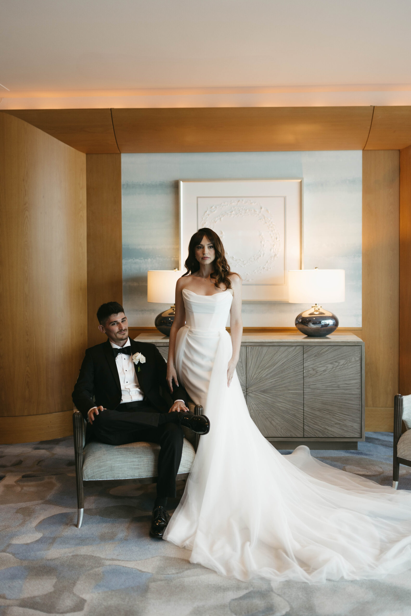 Editorial bride and groom getting ready at The Ritz-Carlton Fort Lauderdale with classic, soft-toned aesthetic