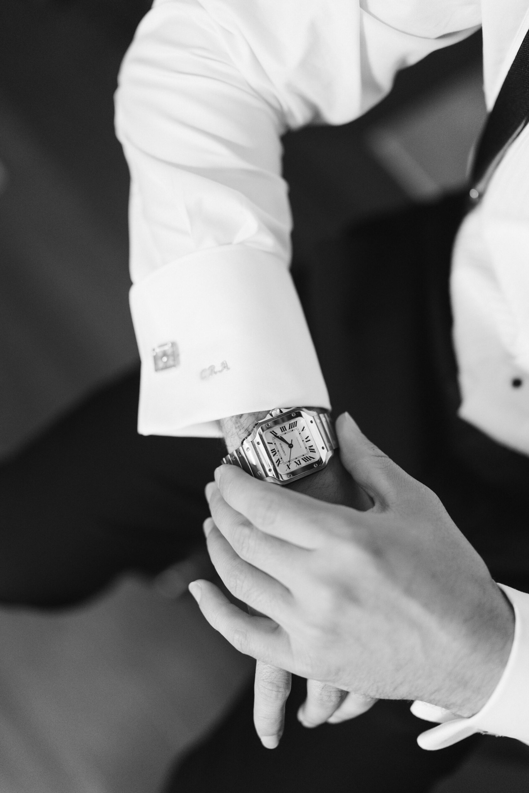 Groom getting ready in classic black tux at de Seversky Mansion wedding