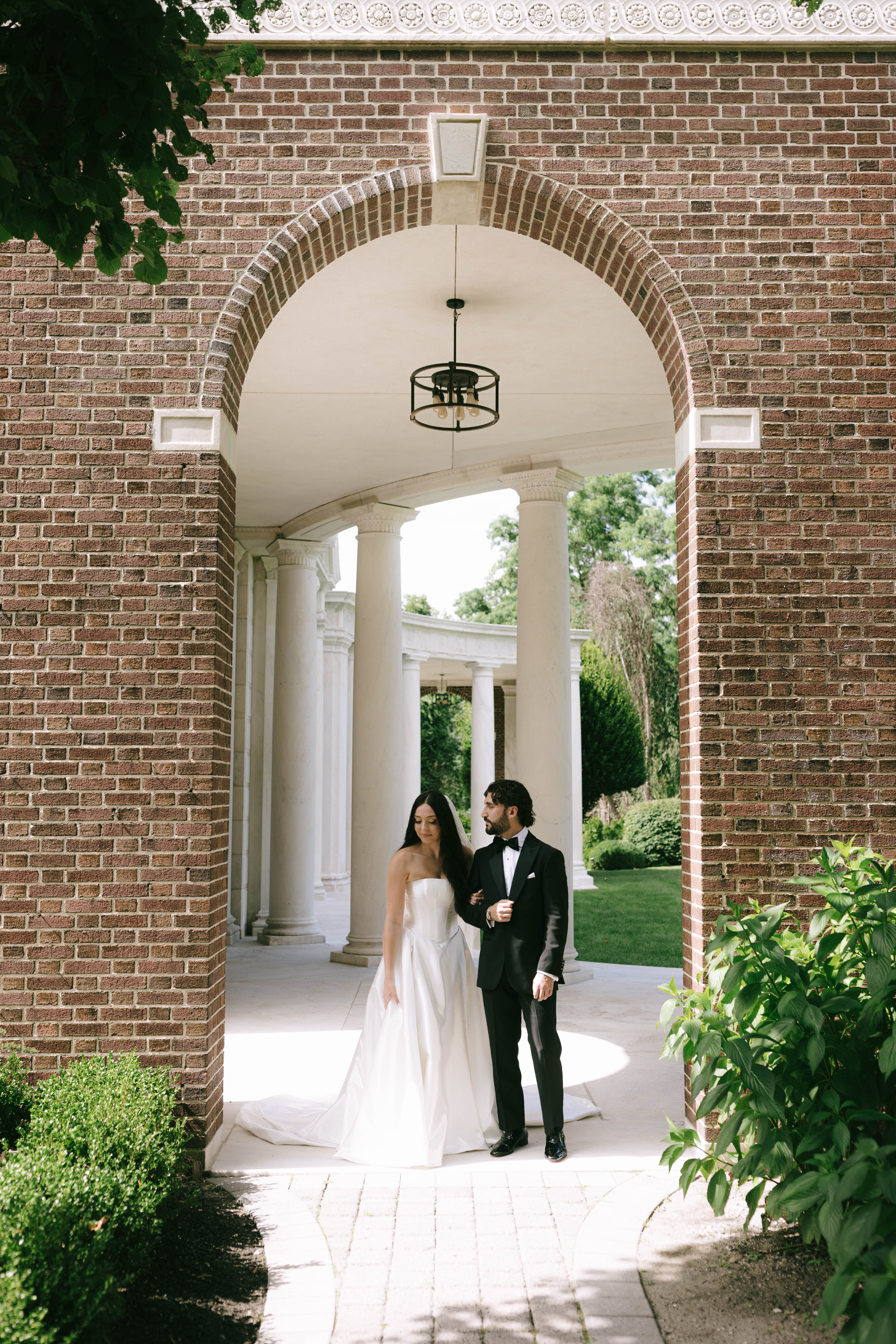 Romantic estate wedding portraits with European-inspired architecture