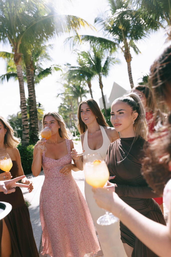 Tropical palm-lined patio at The Beacon during a Jupiter wedding weekend event