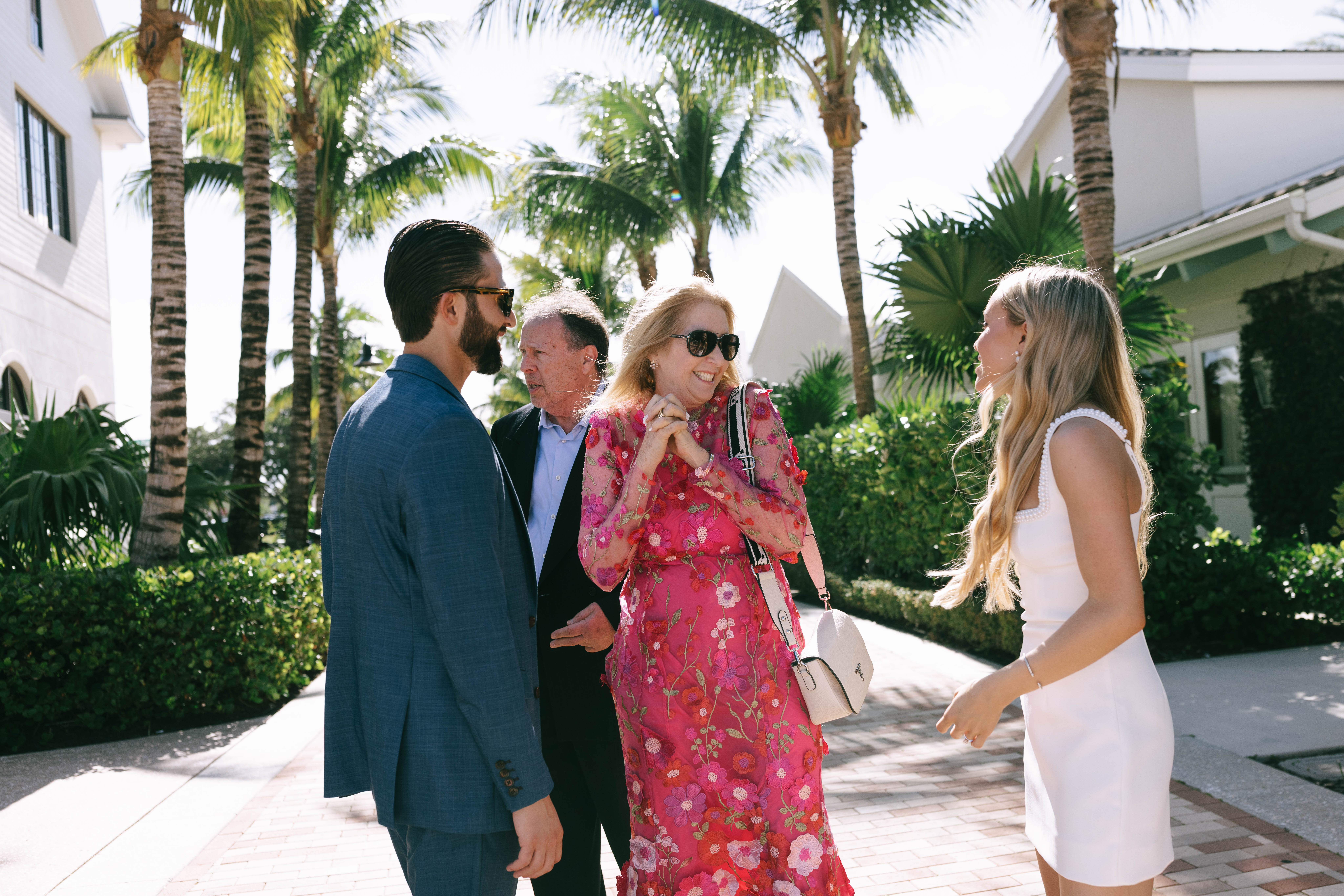 Tropical palm-lined patio at The Beacon during a Jupiter wedding weekend event