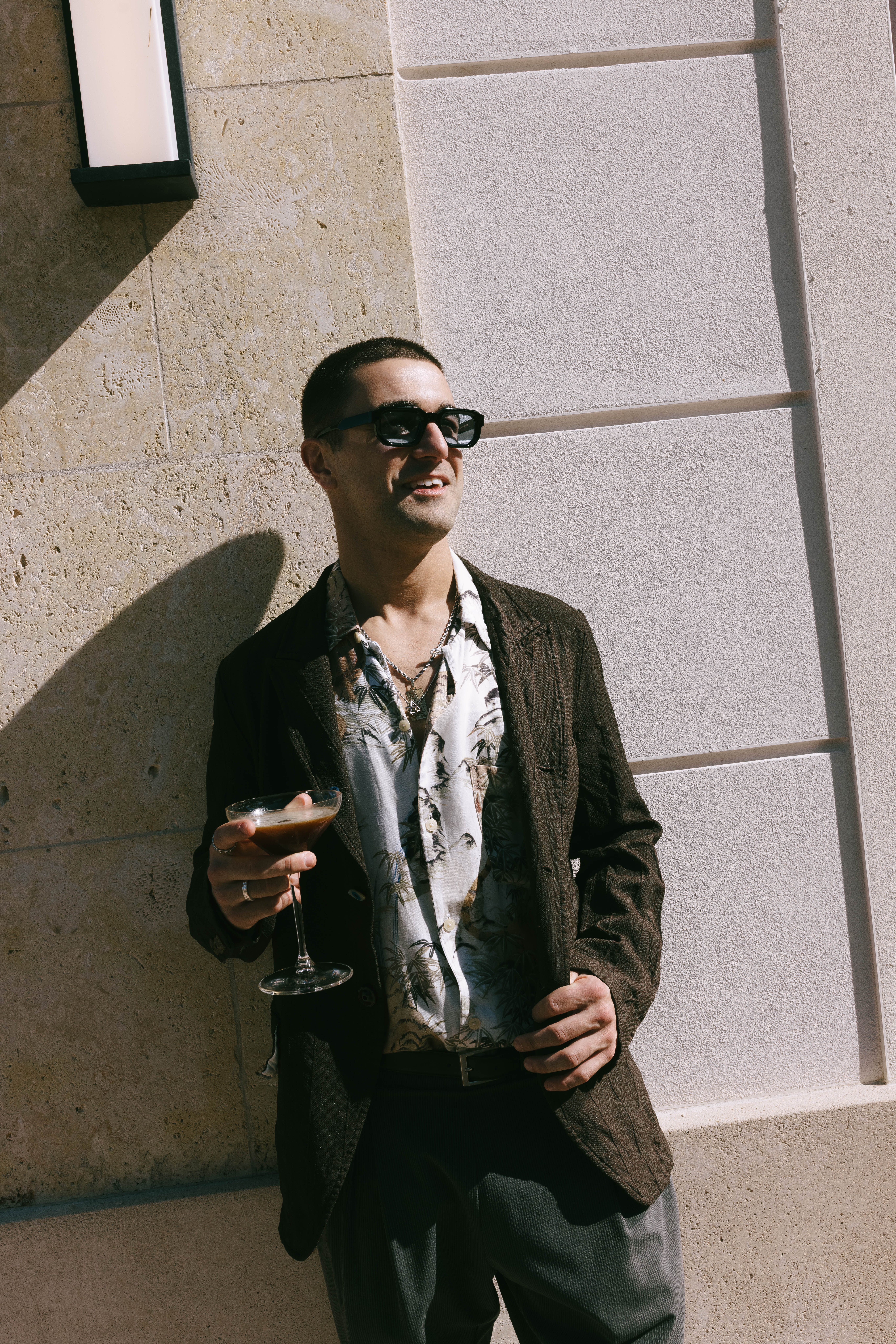 Couples and guests enjoying cocktails at The Beacon welcome party in Jupiter, Florida