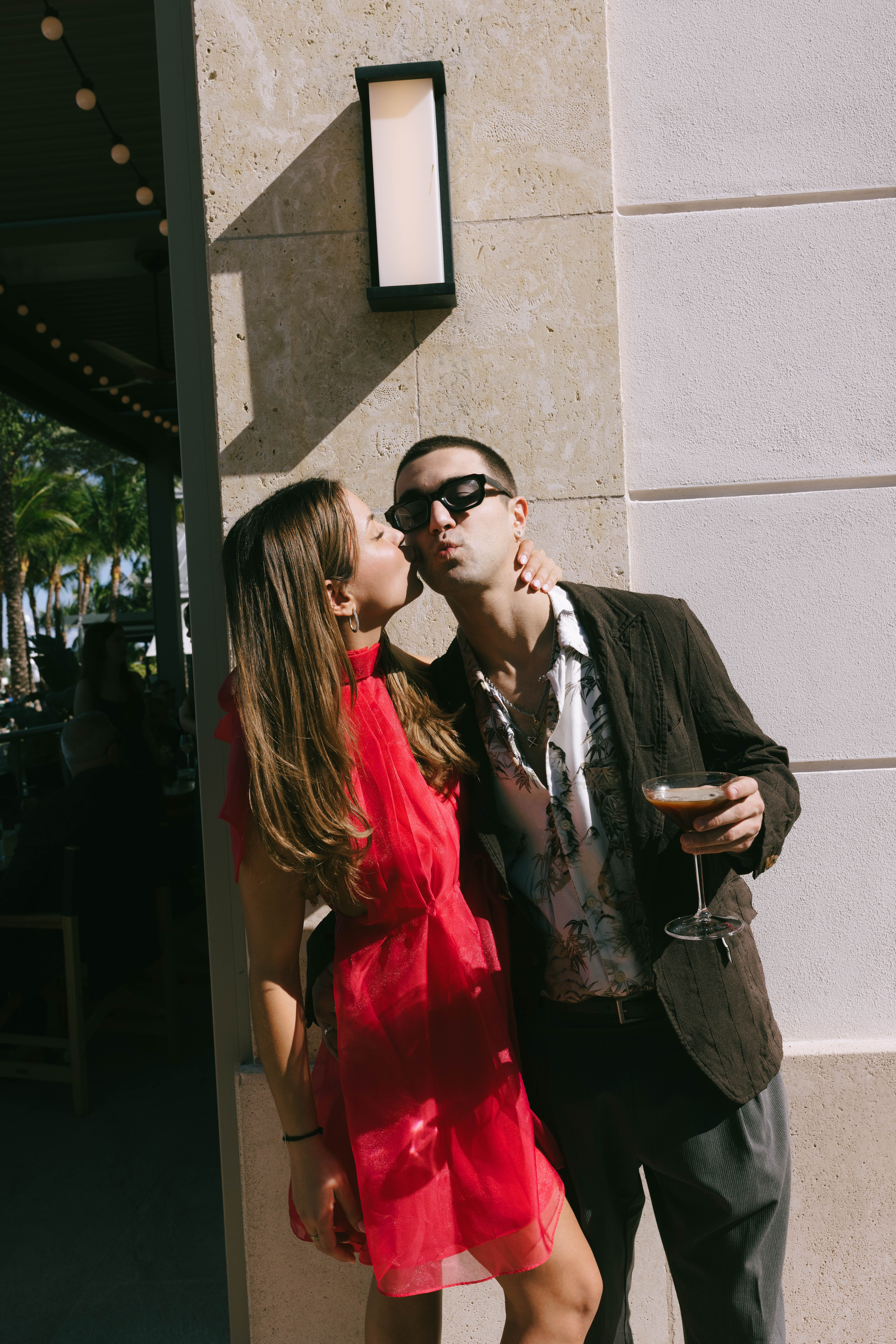 Couples and guests enjoying cocktails at The Beacon welcome party in Jupiter, Florida